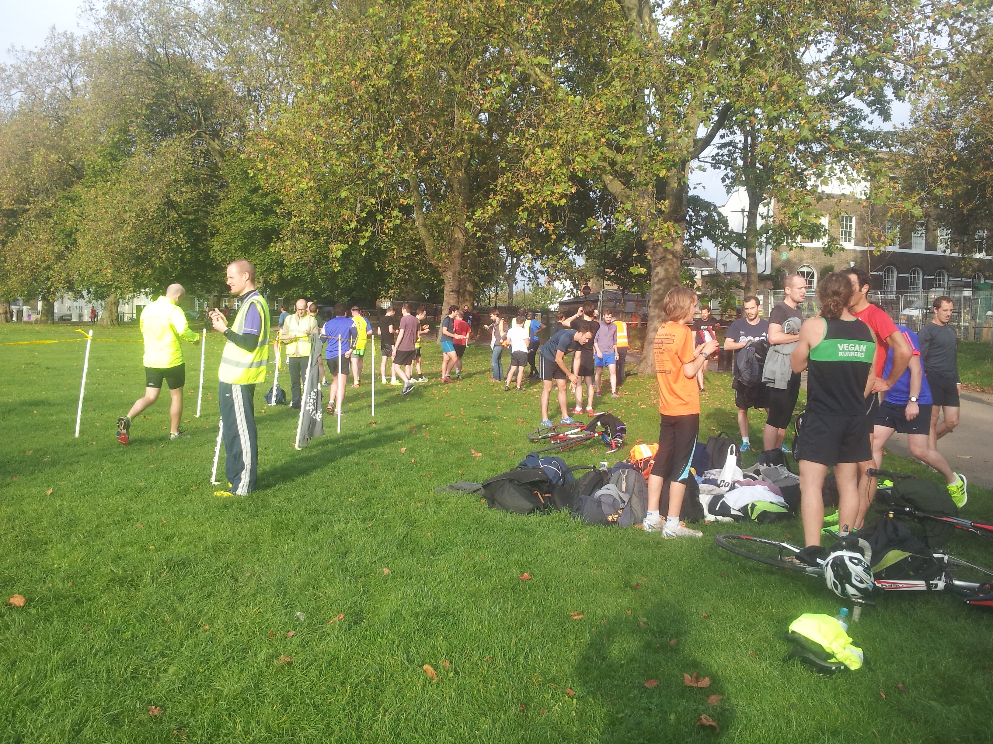 Parkrun finishers on Highbury Fields. The finishing funnel is on the left.