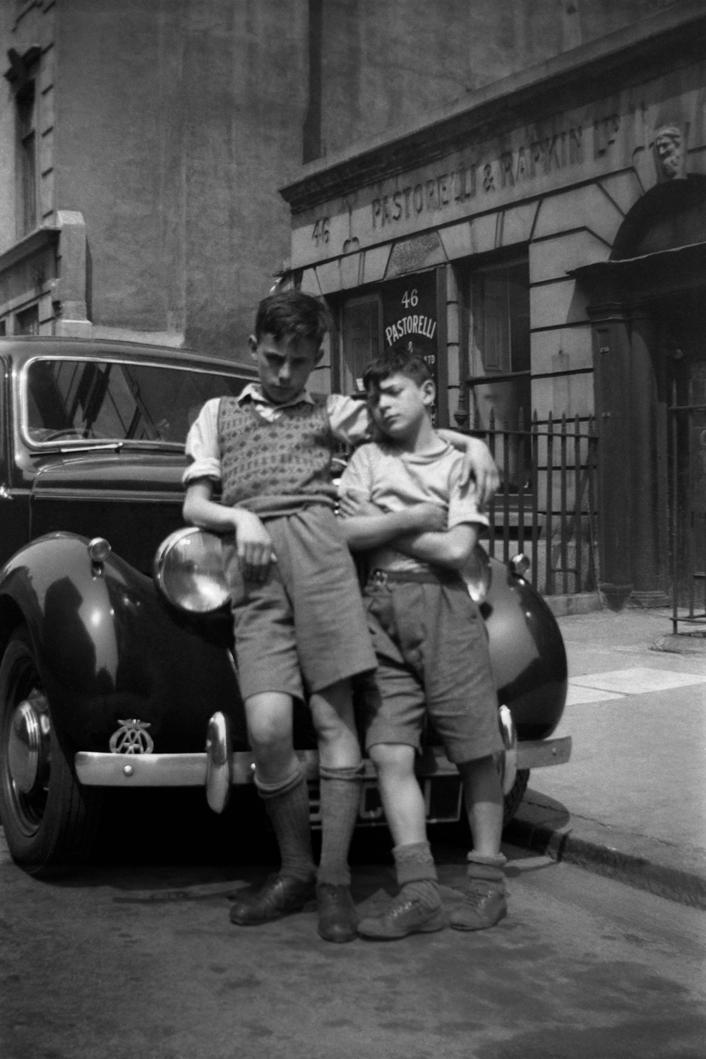 Raymond Scalionne and Razzy in Hatton Gardens, in the lost borough of Finsbury. This photo was taken by Colin O'Brien when he was eight years old. (c) Colin O'Brien