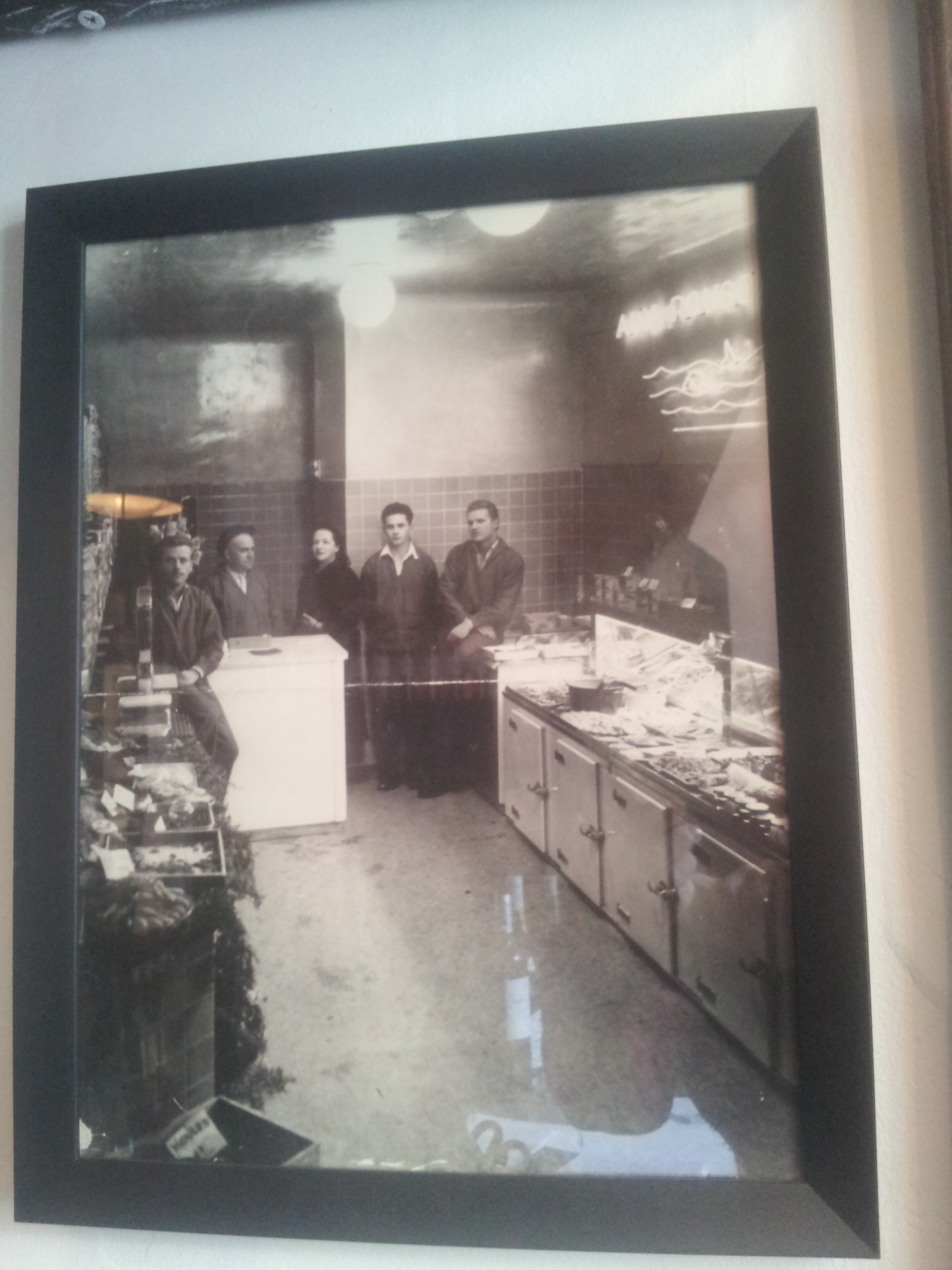 Maxence Masurierâs family at their fish shop, Les Rougets de in the centre of Paris. From left to right itâs his grandfather Roger, great grandfather Henri, great grandmother Natacha, employee Fernand and great uncle Pierre.